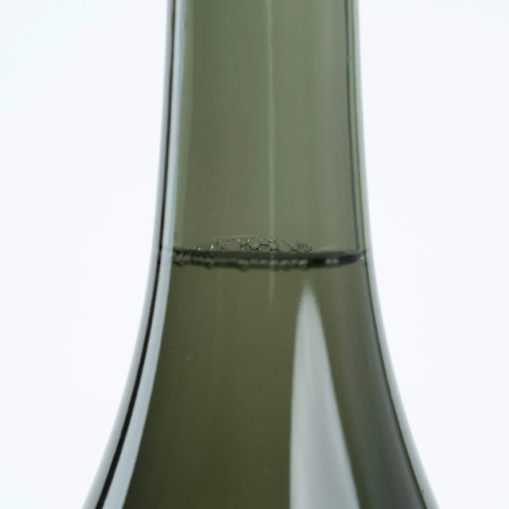 The crystal clear liquid texture of Juyondai Ryusen pour. The pinnacle of sake craftsmanship.