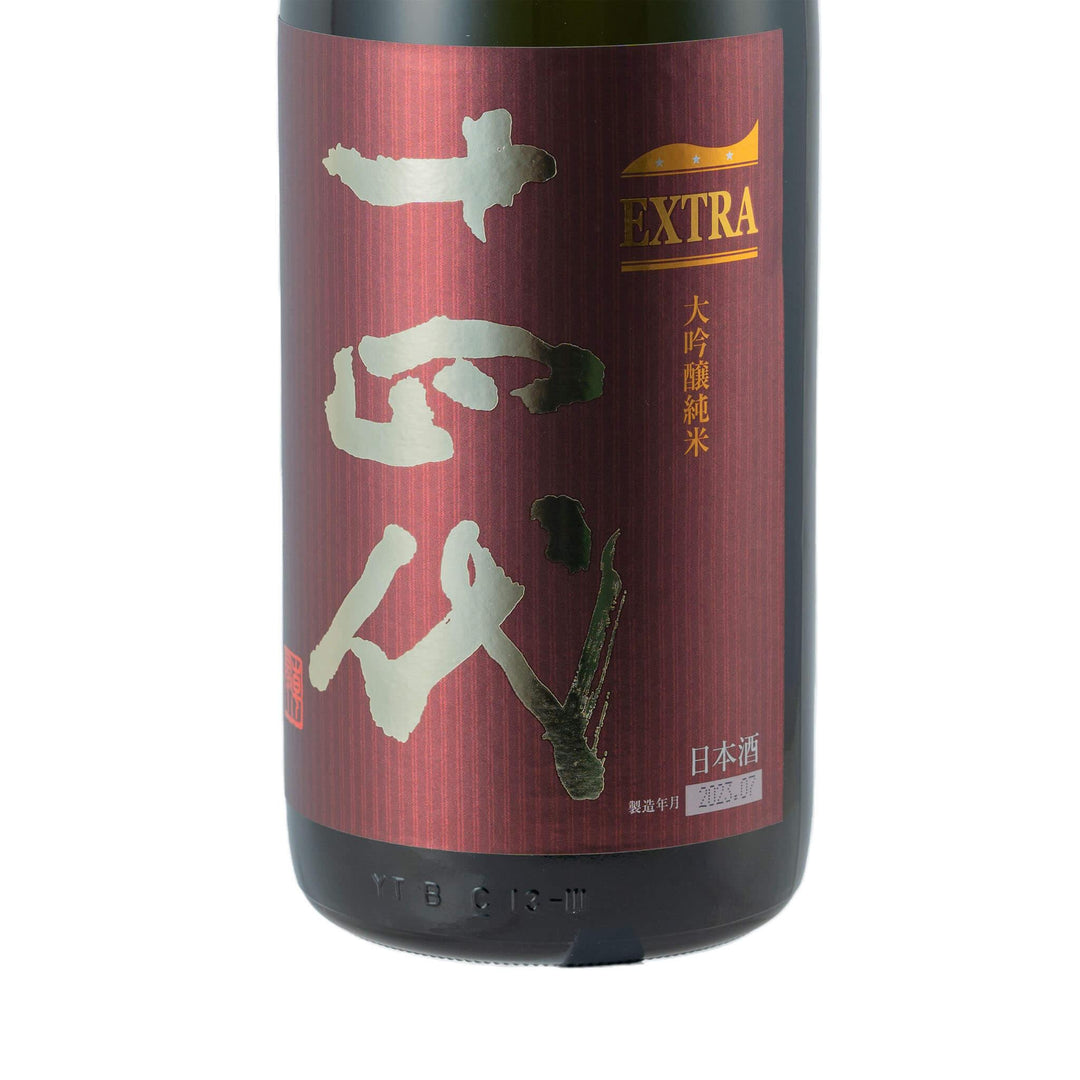 Close-up detail of the Juyondai Extra label calligraphy. TRIPLEMERI LIQUOR STORE.